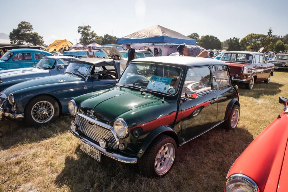 The ever-green Mini Cooper, parked next to an MGA-